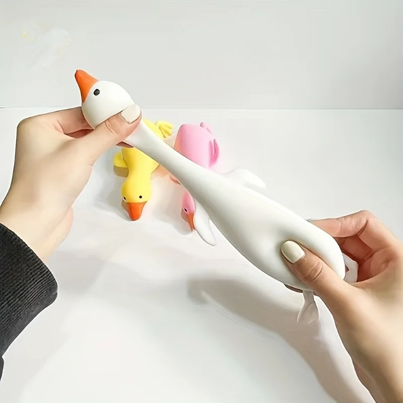 面白いかわいい伸縮性のあるソフトアヒルスクイーズおもちゃスク - Party Games Kids Birthday のレビューと価格