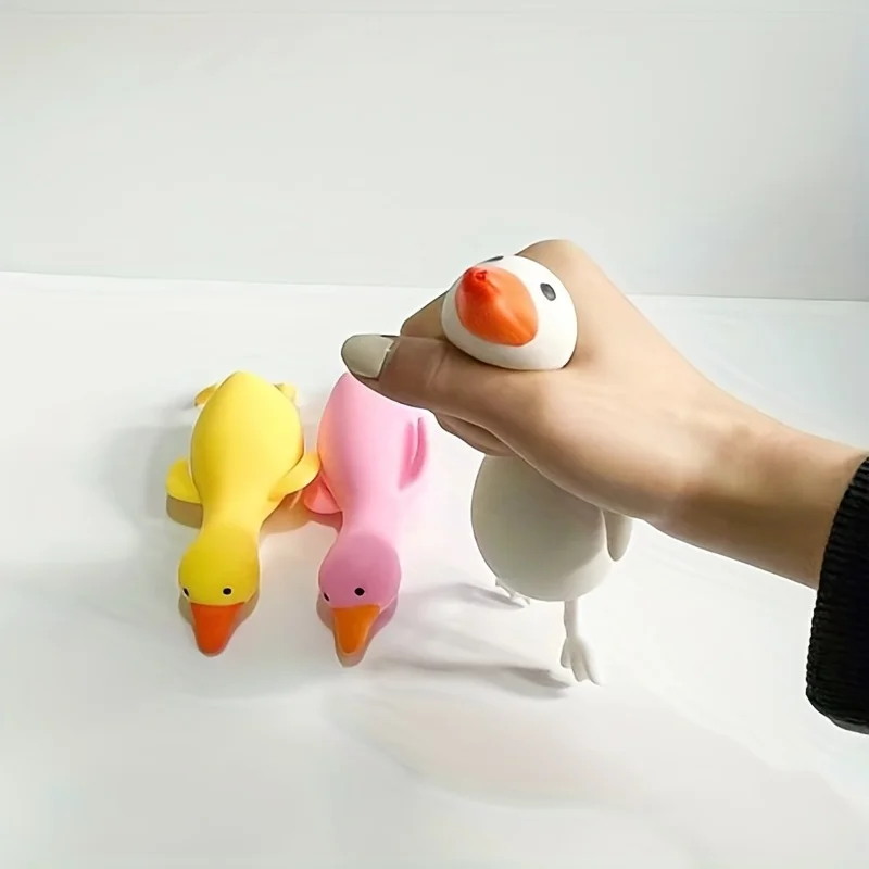 面白いかわいい伸縮性のあるソフトアヒルスクイーズおもちゃスク - Party Games Kids Birthday のレビューと価格